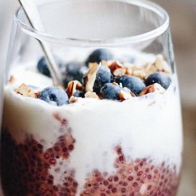 Chia Overnight Oats in a cup with a spoon.