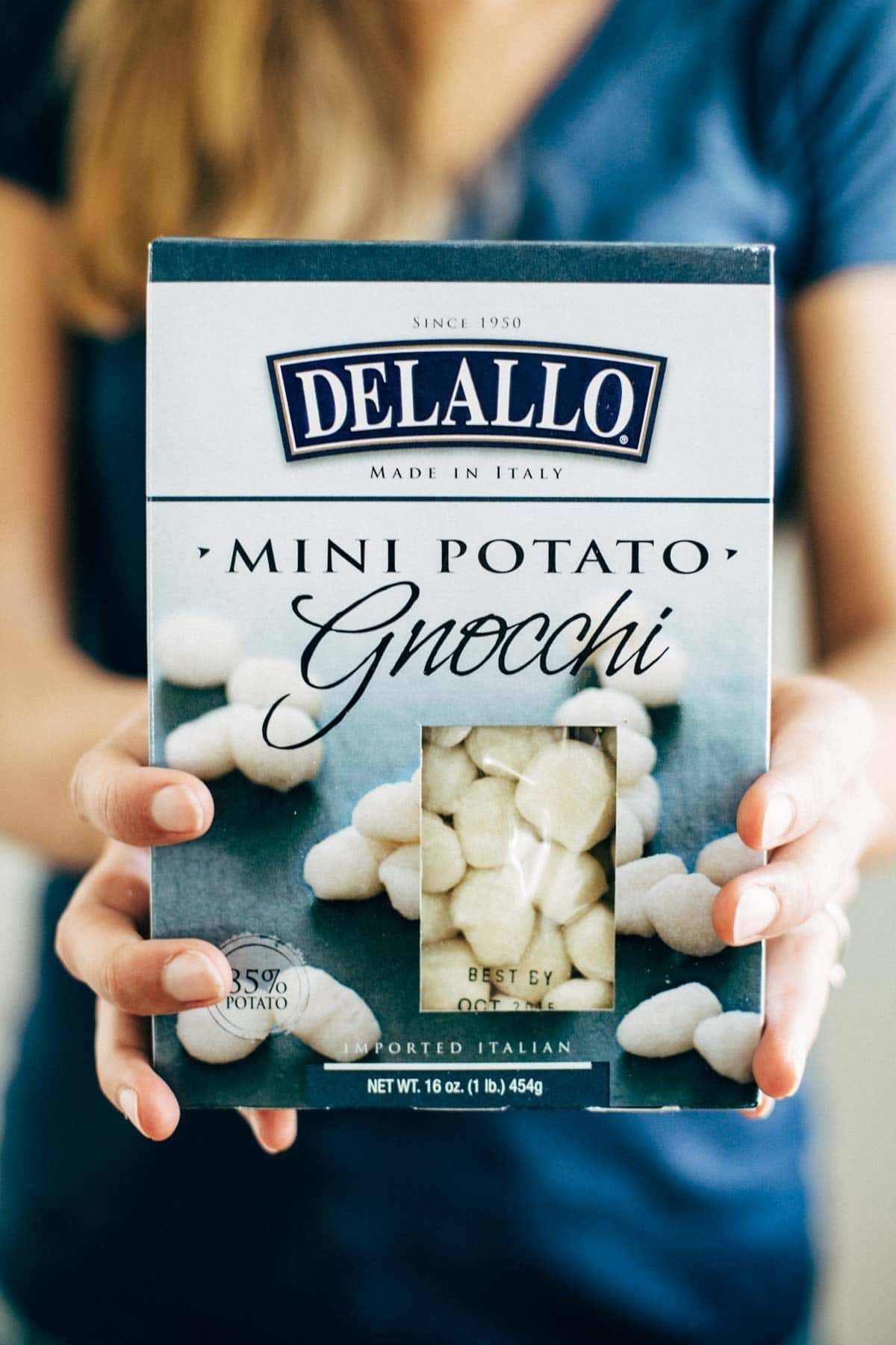 Mushroom Gnocchi with Walnut Pesto and Arugula - a vegetarian bowl that's made with familiar ingredients. Comes together in 30 minutes or less! | pinchofyum.com