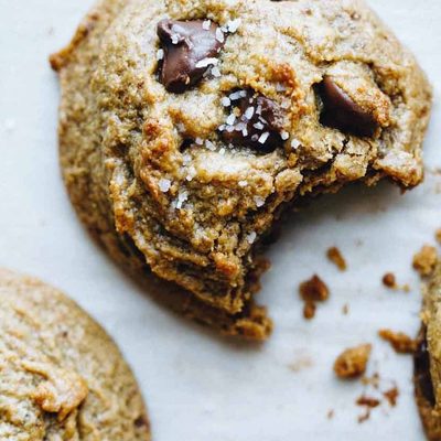 Peanut Butter Chocolate Chip Cookies on parchment paper.
