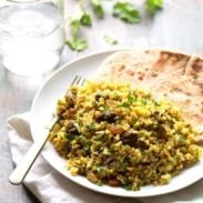 Beef Biryani - slivered almonds, golden raisins, saucy beef, warm spices, and fragrant basmati rice. ❤ le sigh. | pinchofyum.com