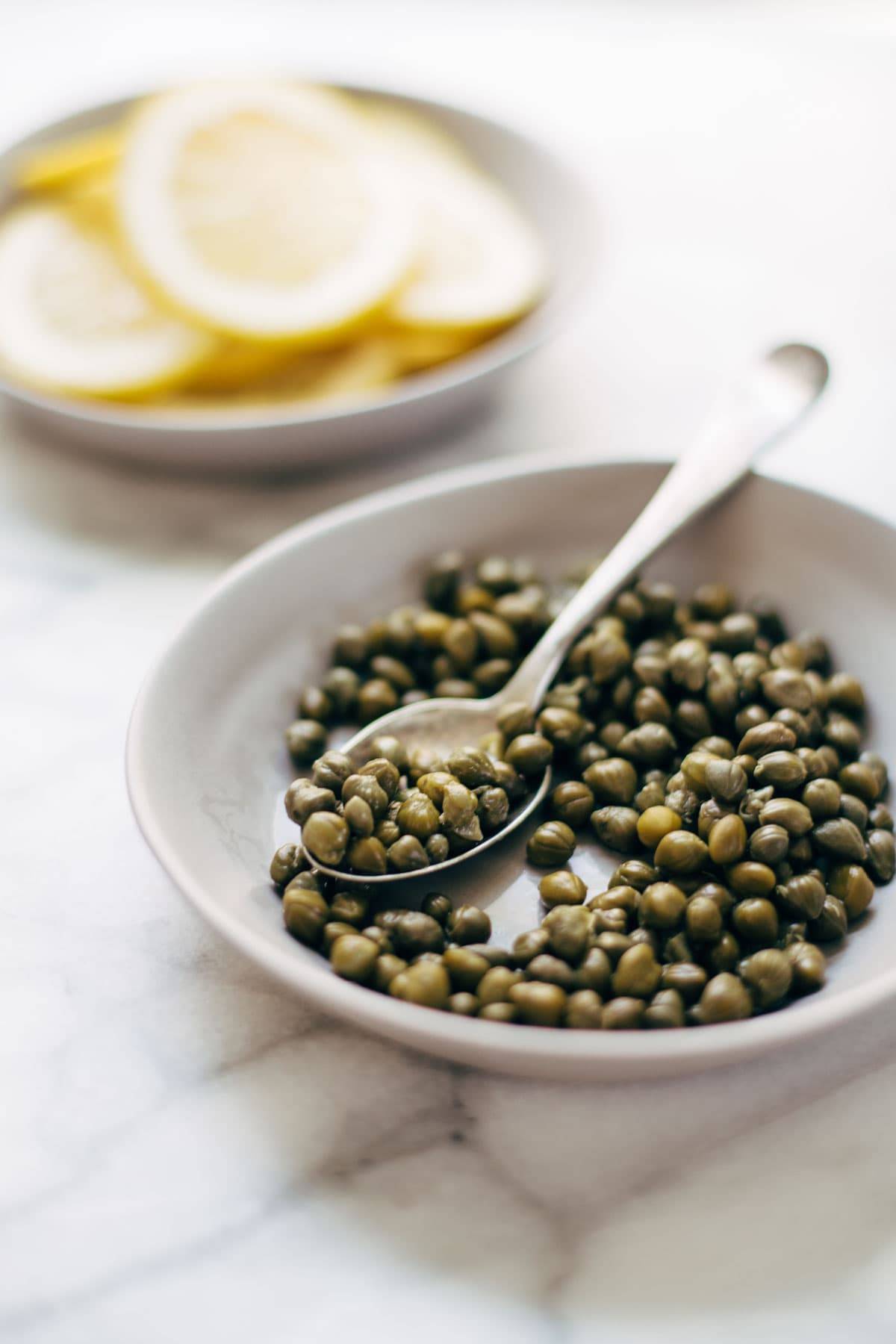 Chicken Piccata - you won't believe how easy this recipe is! Perfect with a green salad and grilled bread for soaking up all the extra sauce. | pinchofyum.com